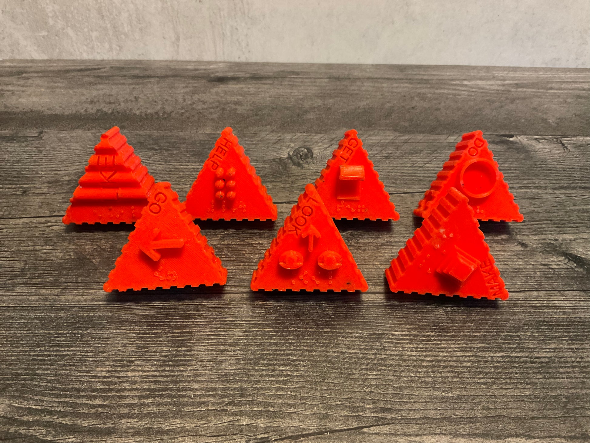 7 red triangular beads Go Like Do Look Help Get Make