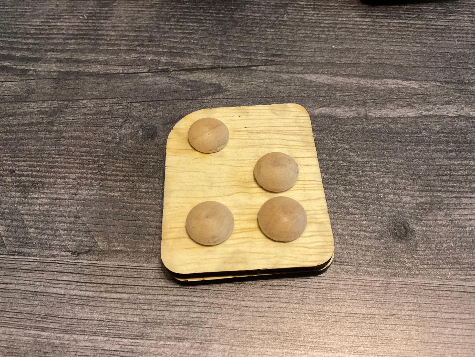 A close up of the Z with the braille side showing.