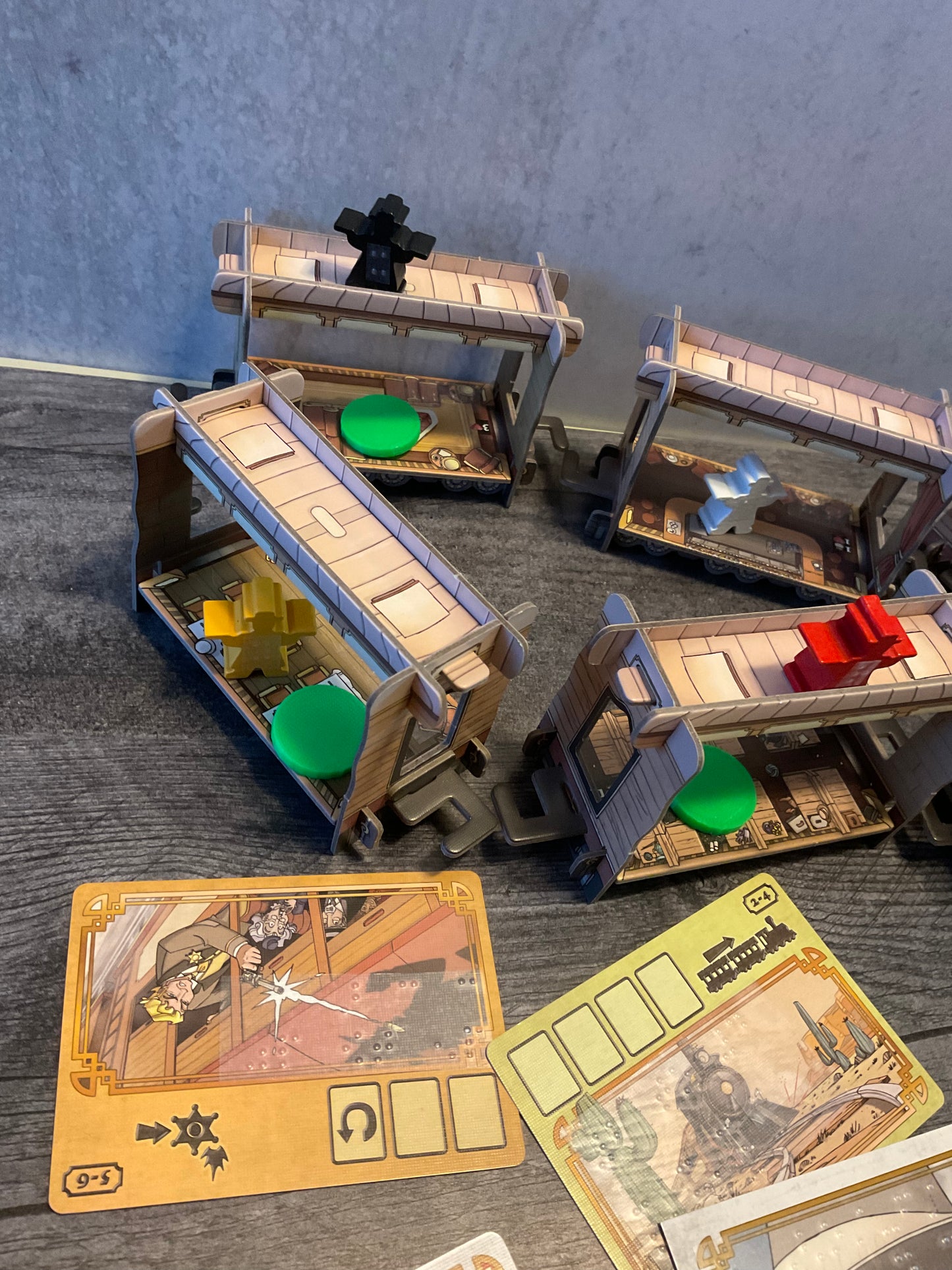 A picture of the brailed scene cards and the train setup.