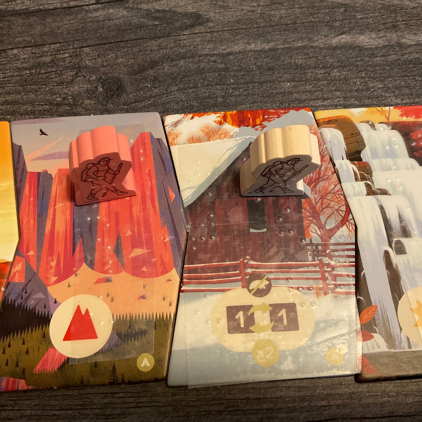 close up on the player pieces and the trail