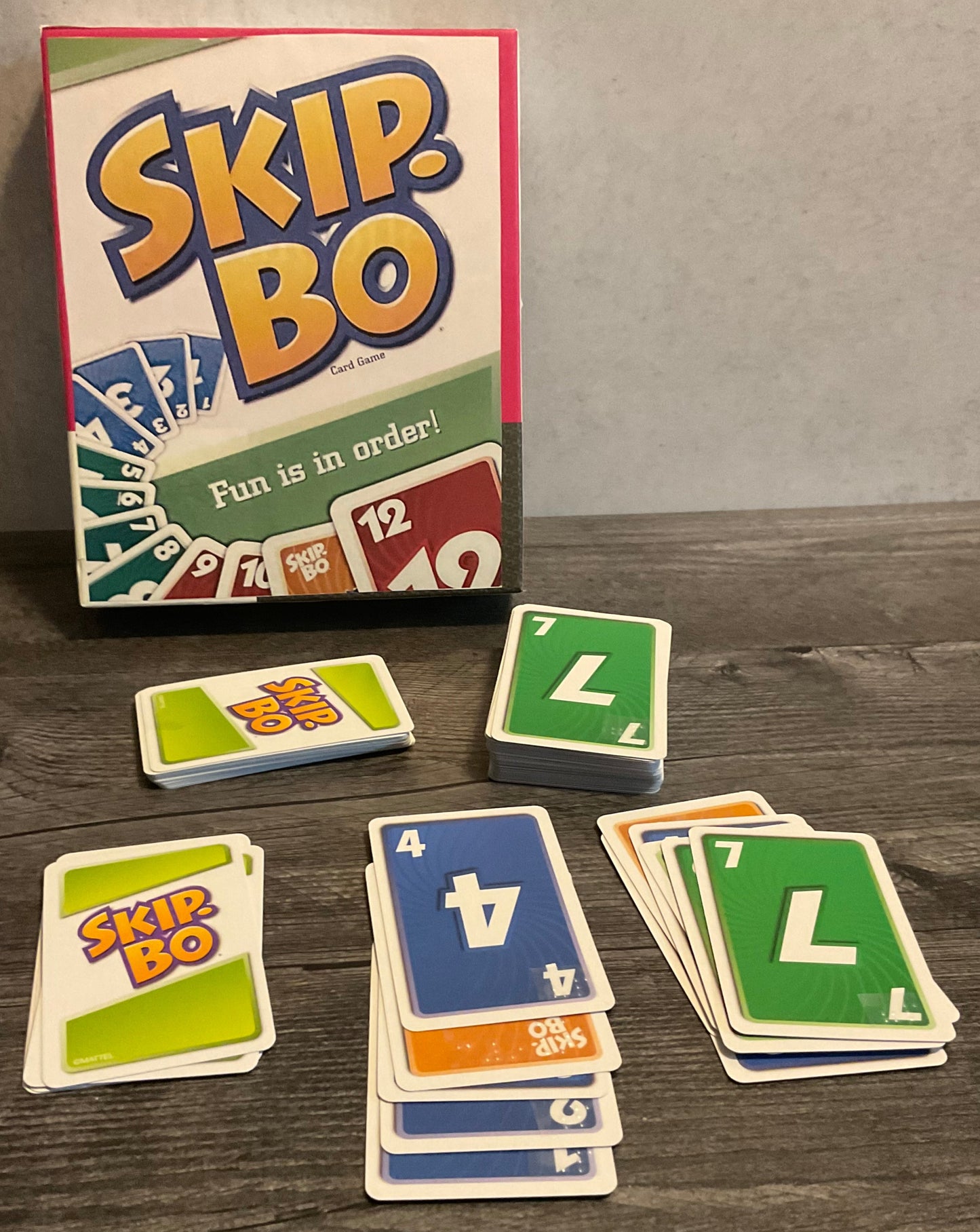A shot showing the cards laid out. Every card has transparent braille on them.