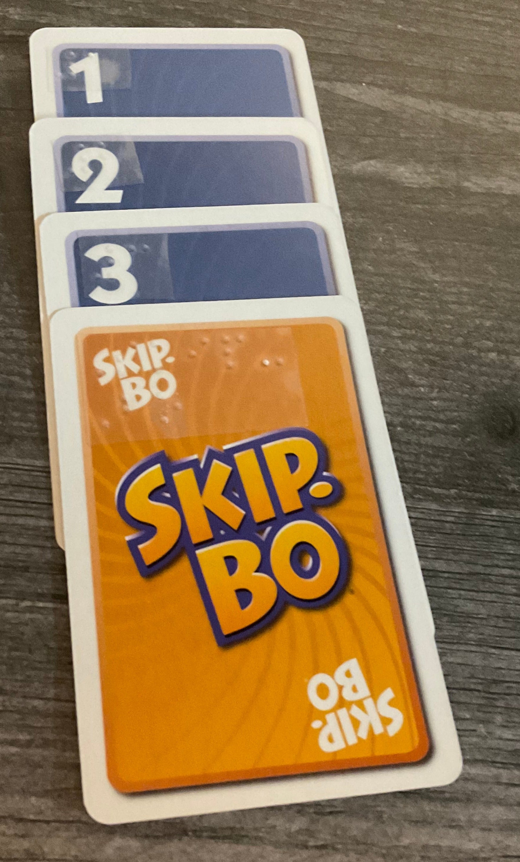 A sequence of cards 1-4, with the 4 being replaced with a skip-bo card.