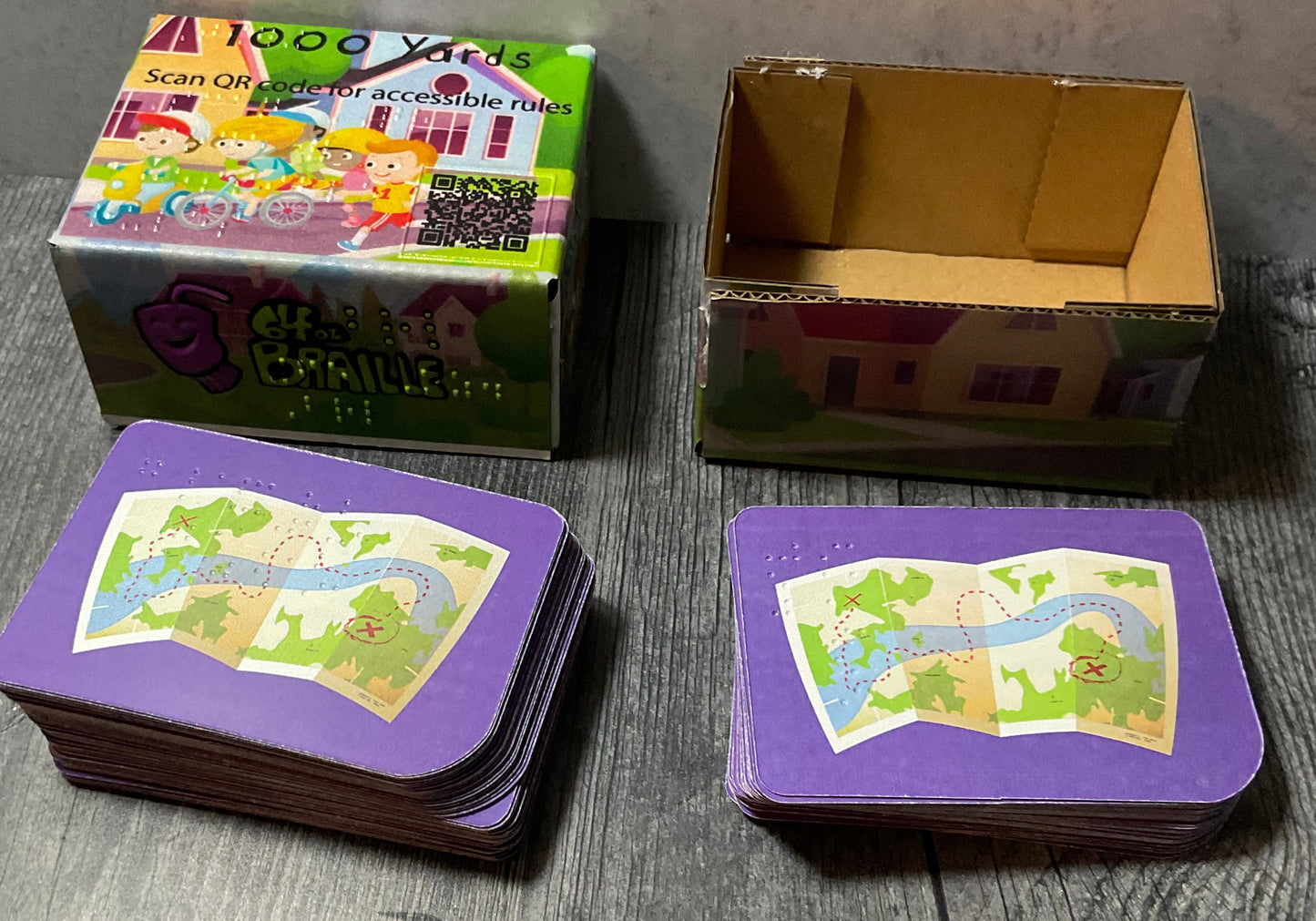 A shot of the prototype 1000 Yards box and the cards.
