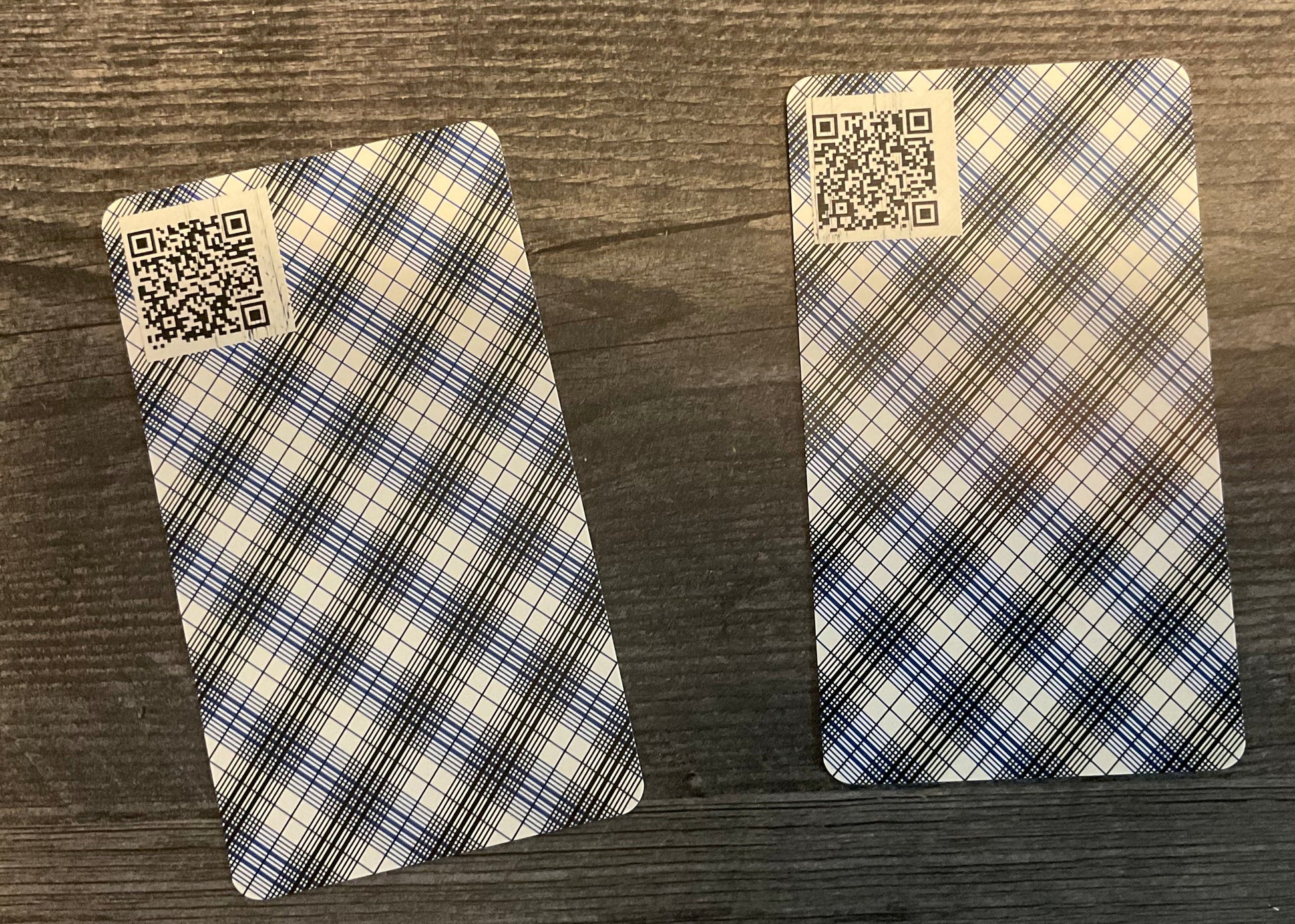 The back of two of the cards. They have small QR code stickers on them that lead to wikipedia.