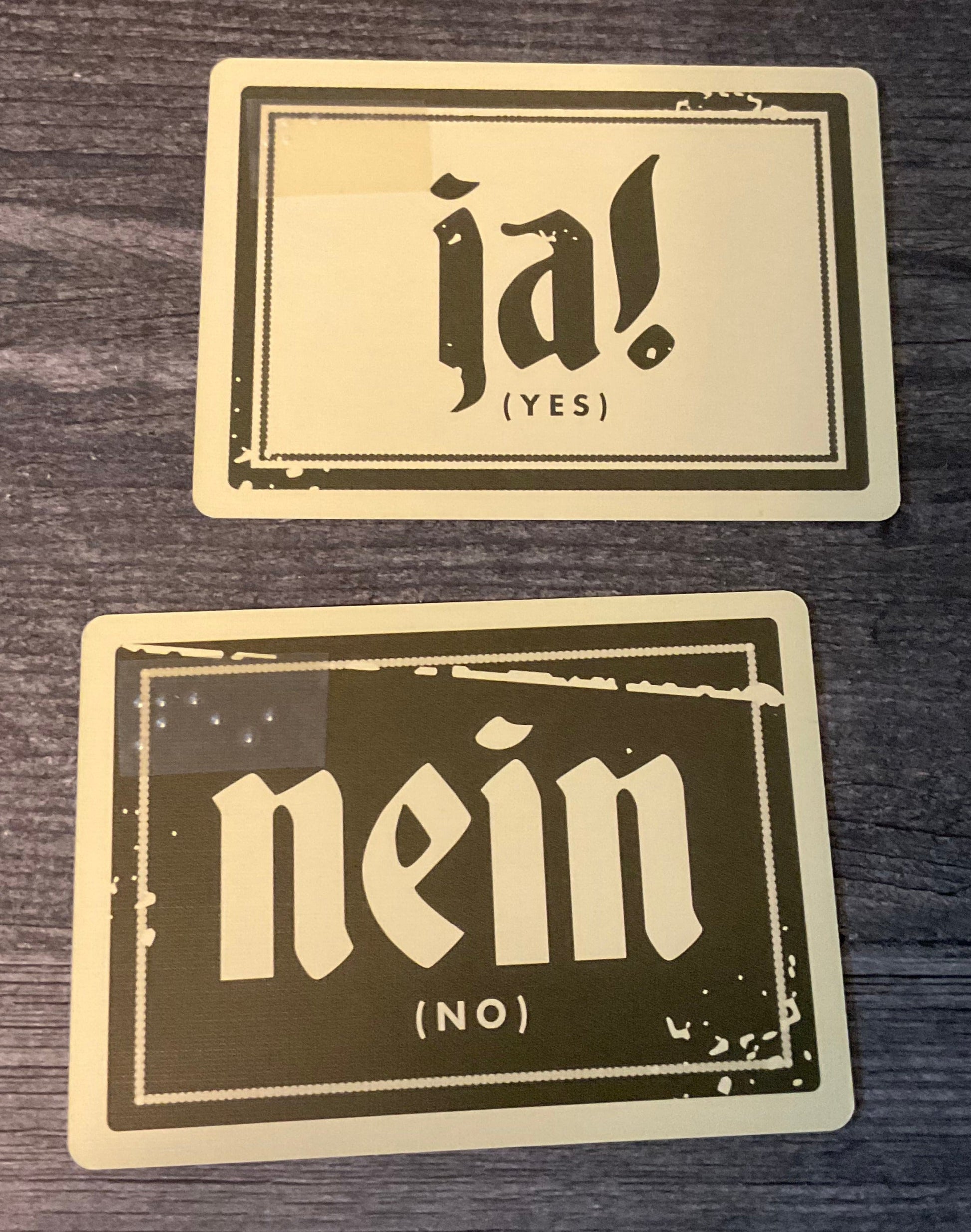 The Ja and nein cards. both have transparent braille on them