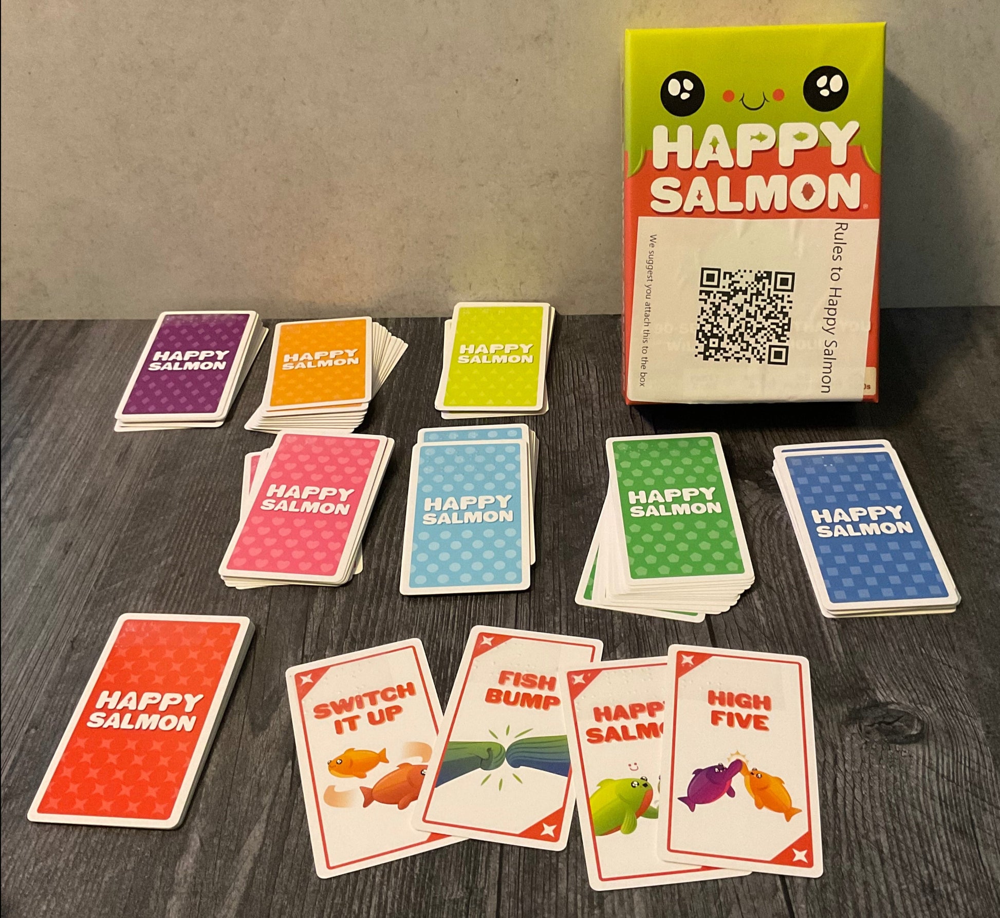 The game happy salmon with transparent braille on all of the cards.