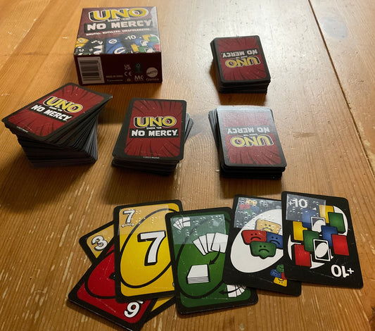 A picture of Uno No Mercy laid out on the table.