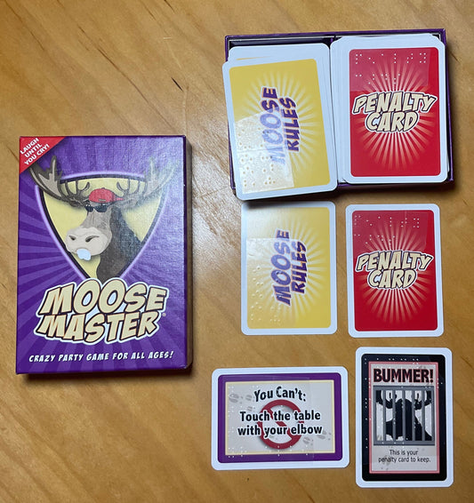 Moose master game with braille on it.