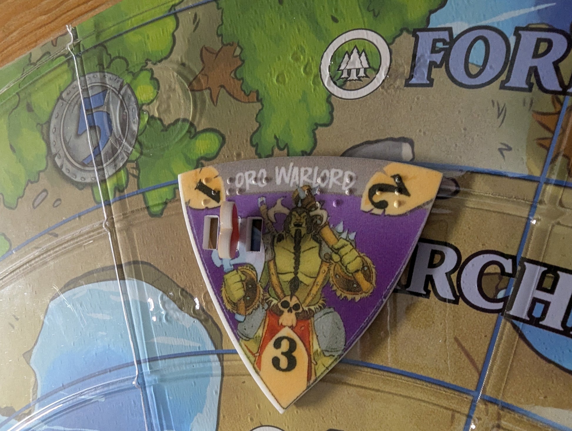 Close up on the replacement monster token with a heart token on it to keep track of health.